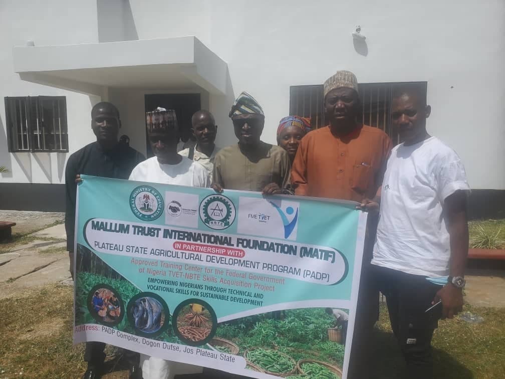 MATIF training group photo with banner
